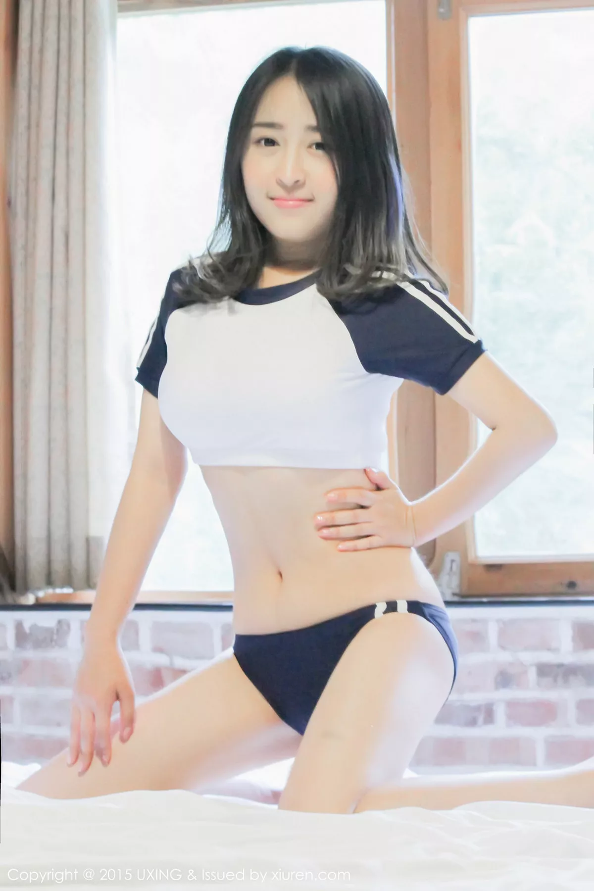 秀人集.com_[UXING优星馆]Vol.017_嫩模煊煊sunny爱吃棒棒糖的连体泳装妹子性感写真50P