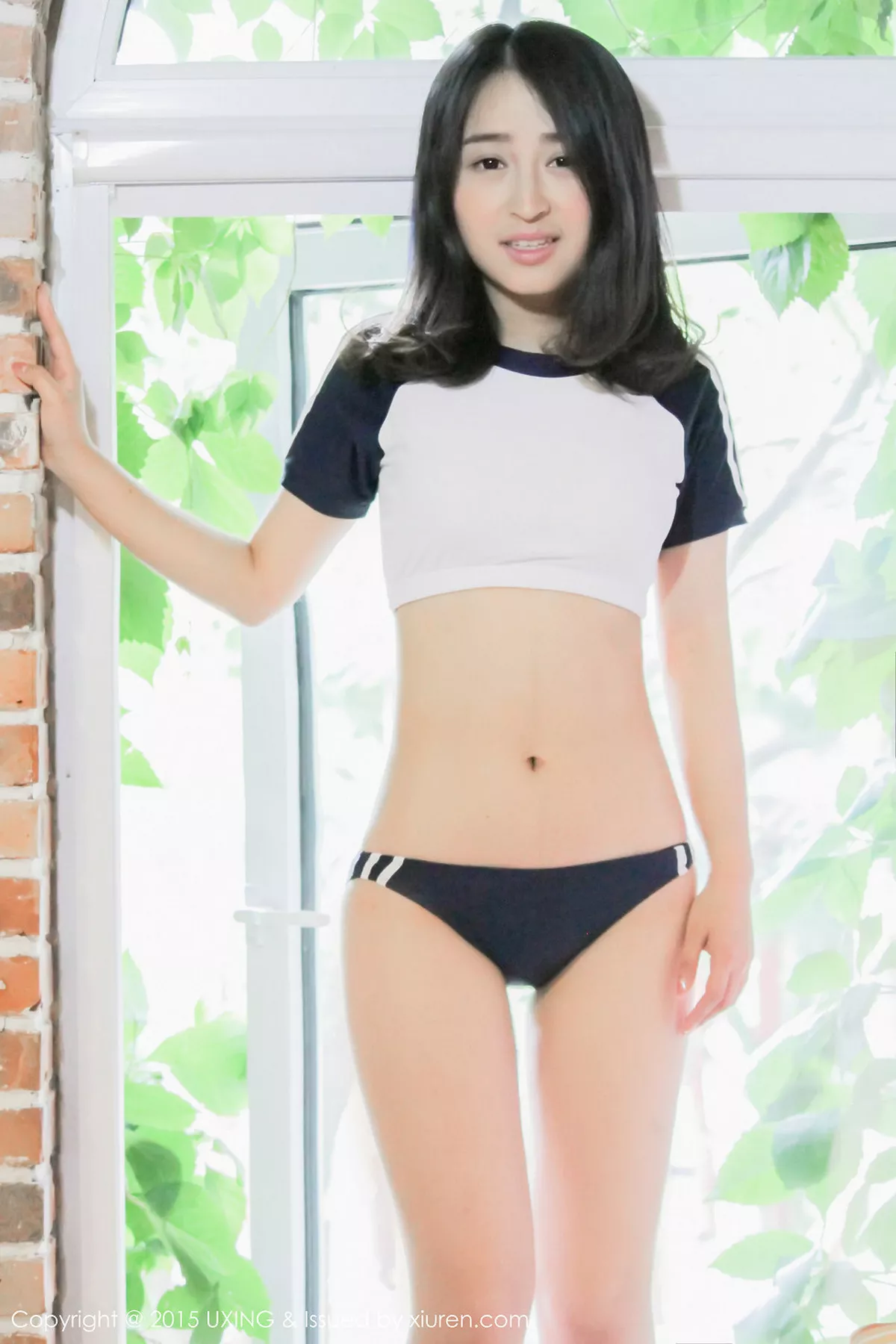 秀人集.com_[UXING优星馆]Vol.017_嫩模煊煊sunny爱吃棒棒糖的连体泳装妹子性感写真50P