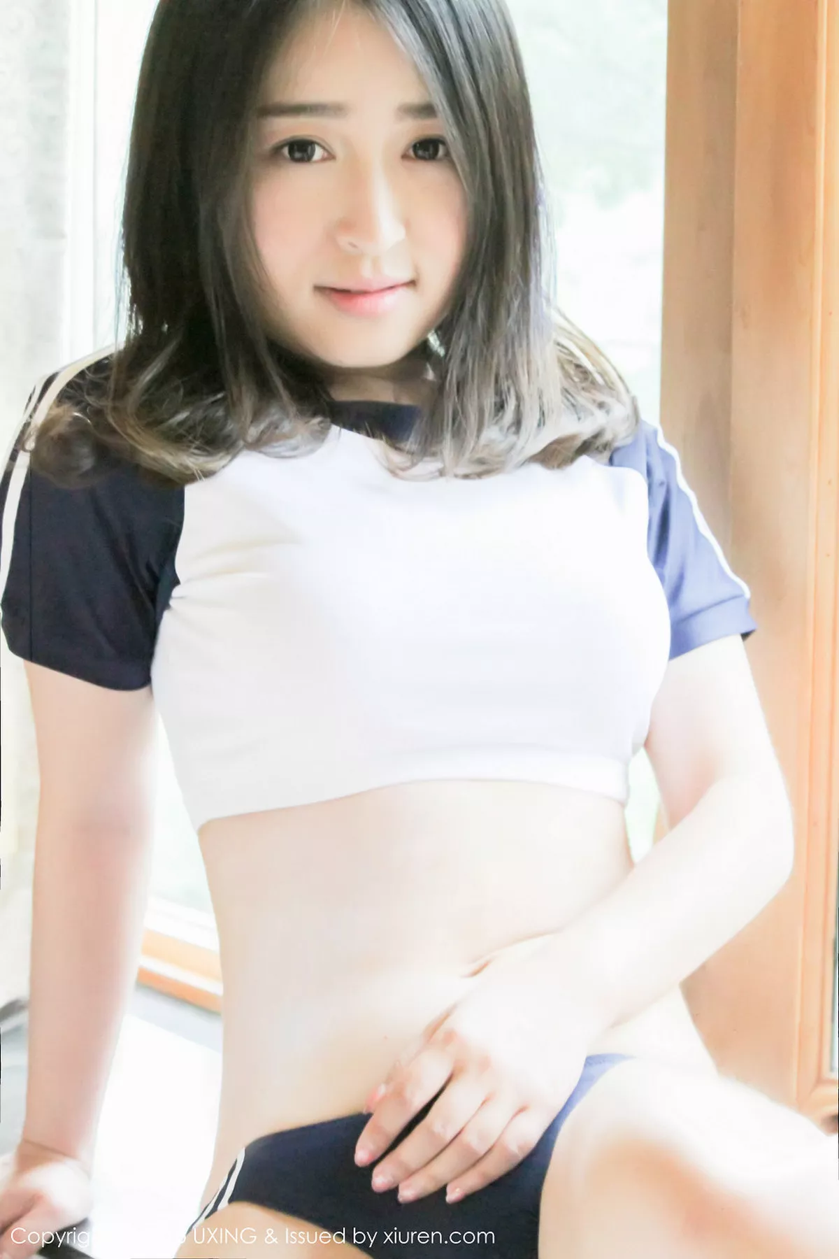 秀人集.com_[UXING优星馆]Vol.017_嫩模煊煊sunny爱吃棒棒糖的连体泳装妹子性感写真50P