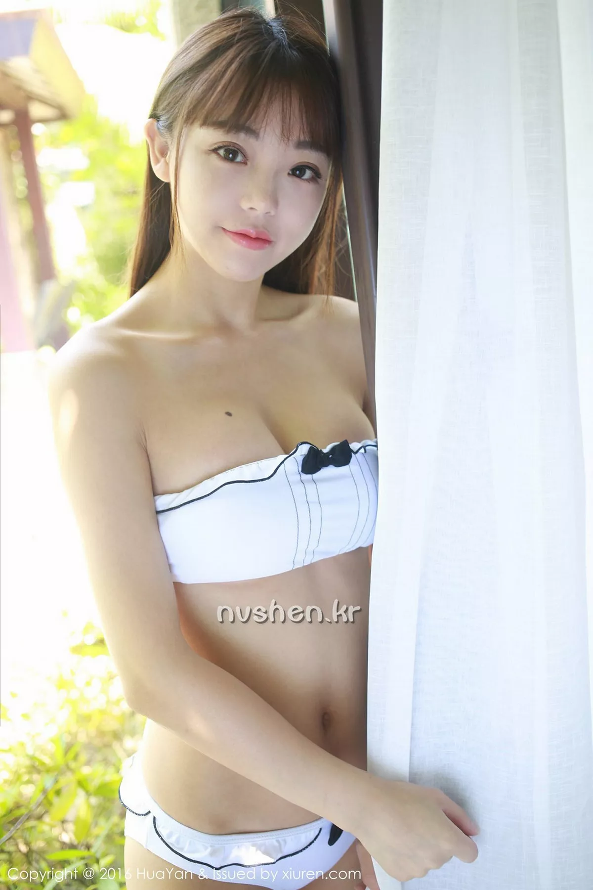 秀人集.com_[HuaYan花の颜]Vol.008_嫩模佘贝拉bella三亚旅拍白色比基尼秀完美身材性感写真46P