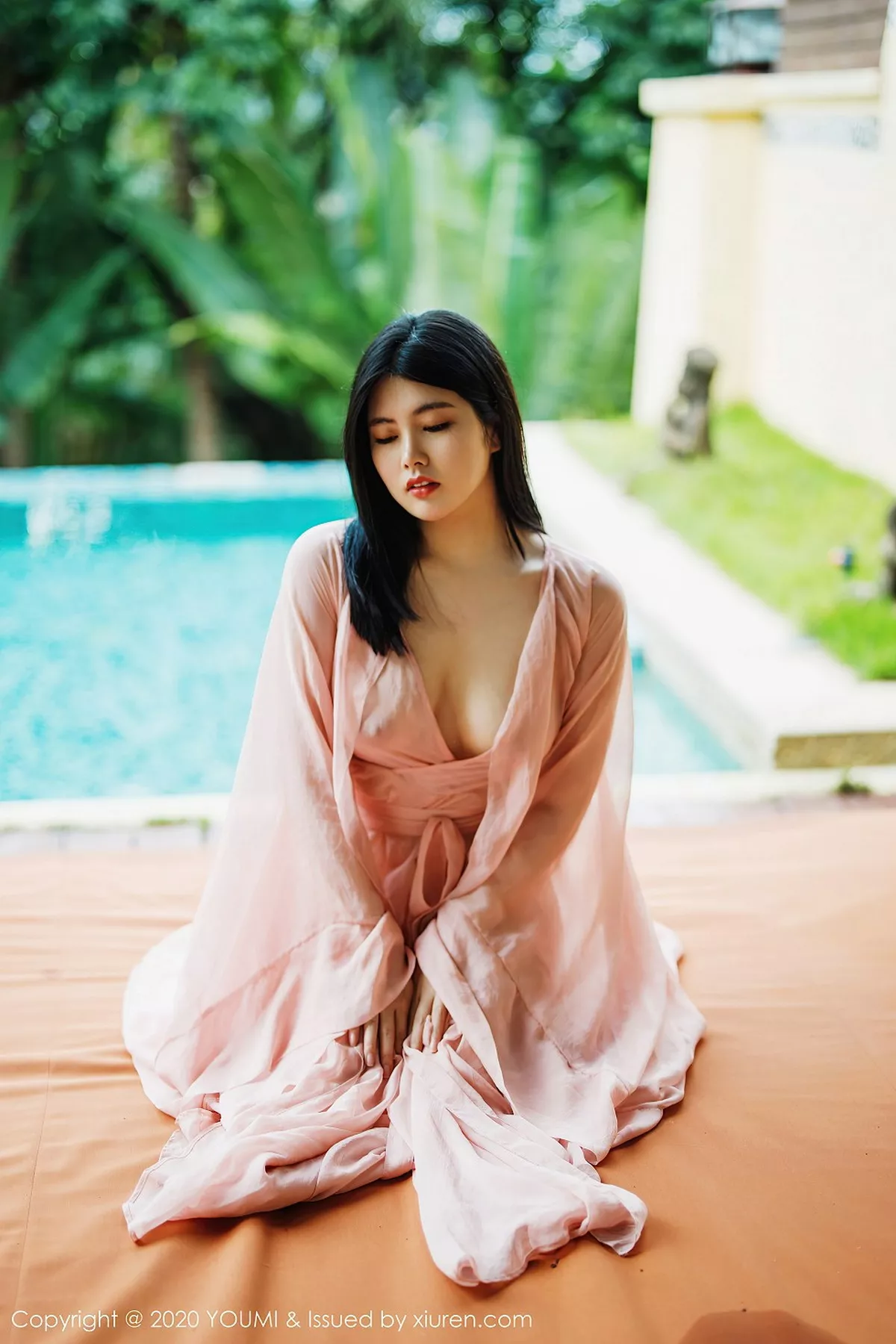 秀人集.com_[YouMi尤蜜荟]Vol.523_女神娜露Selena西双版纳旅拍轻薄粉色长裙秀傲人豪乳诱惑写真89P