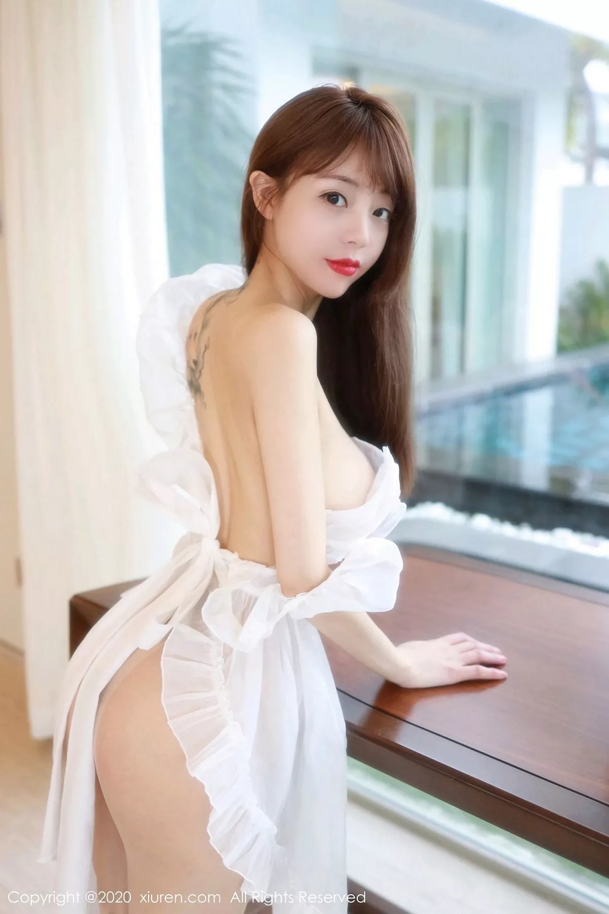 秀人集.com_[XiuRen秀人网]No.2869_嫩模佘贝拉bella三亚旅拍淡雅薄纱裙透视秀火辣身材诱惑写真42P